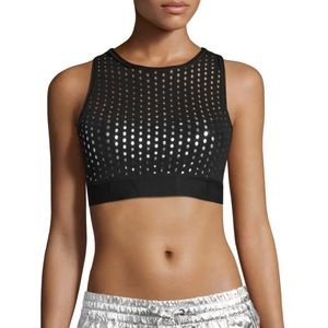 Alala sports bra in circular mesh with metallic bandeau lining. 
Size S
